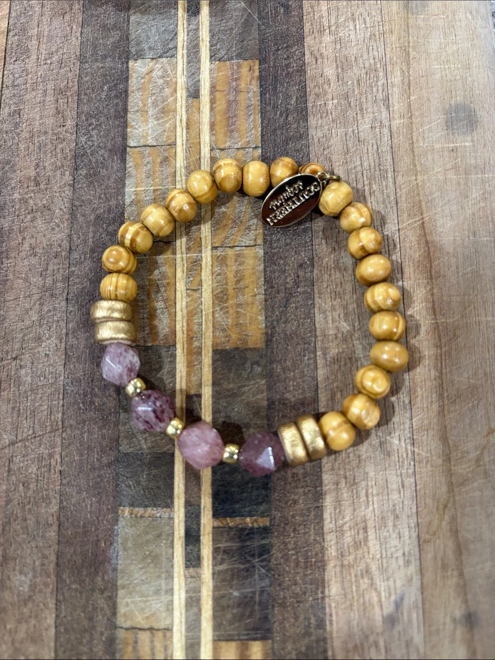 (3) beaded bracelets and (1) pair earrings